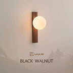 AureliaSphere Walnut Wood and Glass Sphere Wall Lamp | Deretia