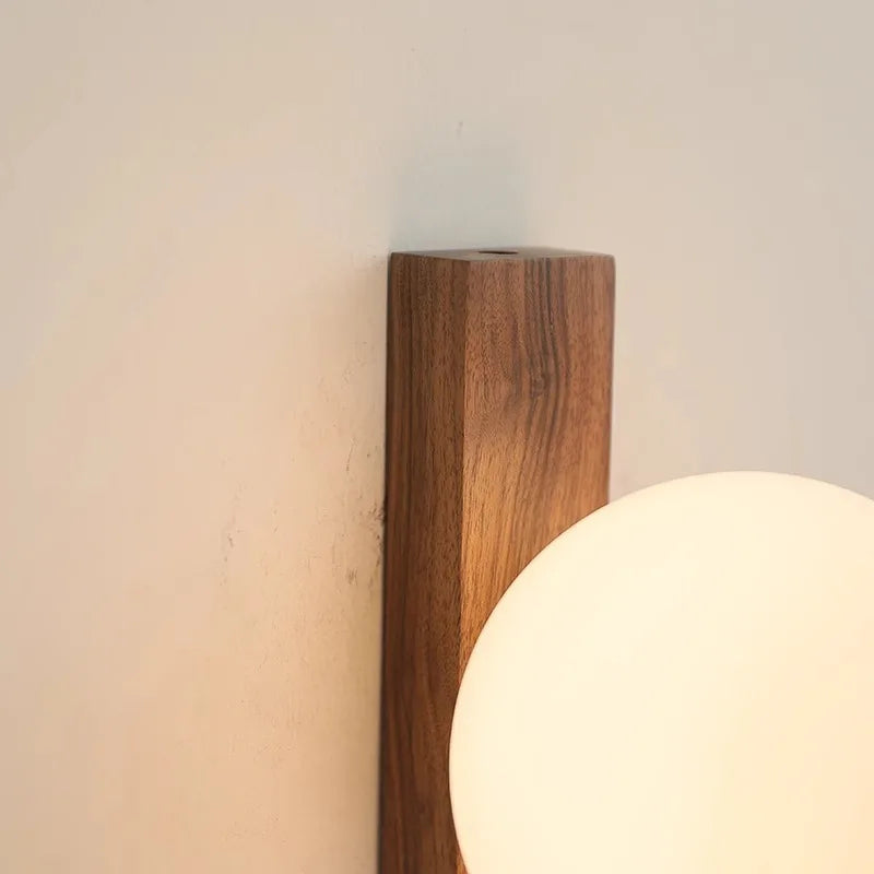 AureliaSphere Walnut Wood and Glass Sphere Wall Lamp | Deretia